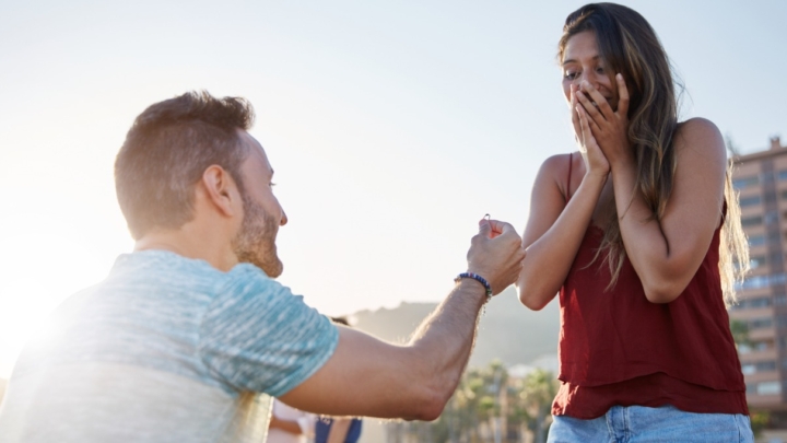 Happy Girl Smiling To Her Boyfriend Proposing To Her Picture Id868935822